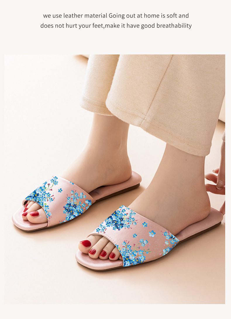 Elegante flache Damenpantoffeln mit Blumenmuster
