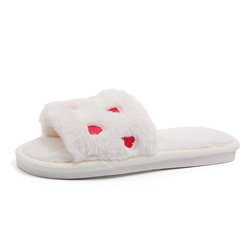 Pantuflas de mujer de felpa suave con punta abierta y bordado de corazón.