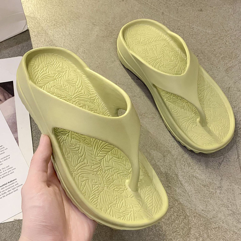 Dames teenslippers met platformzool en gestructureerd voetbed. 7