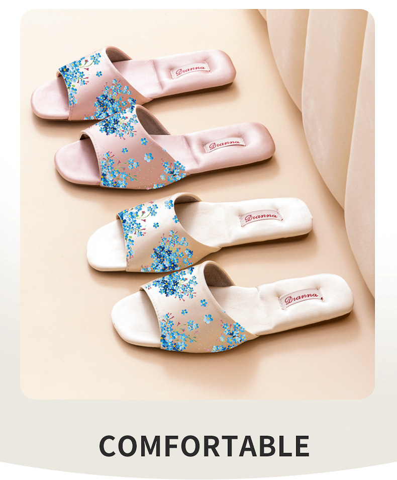 Elegante flache Damenpantoffeln mit Blumenmuster